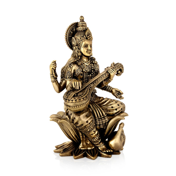 Saraswati sitting on Kamal Base Murti - 10 x 6 inches | Antique Brass Idol / Vagdevi with arch Statue for pooja - Brass Murties