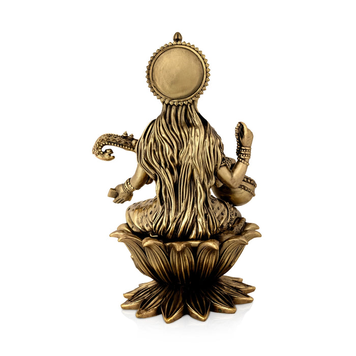 Saraswati sitting on Kamal Base Murti - 10 x 6 inches | Antique Brass Idol / Vagdevi with arch Statue for pooja - Brass Murties