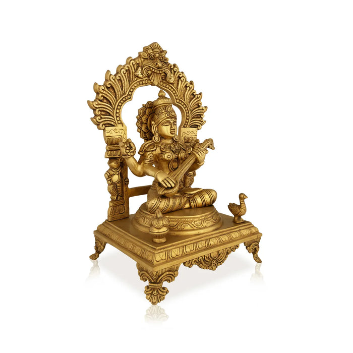 Saraswati sitting on chowki Murti - 14 x 9 inches | Vagdevi with arch Statue/ saraswathy idol for pooja - Brass Murties