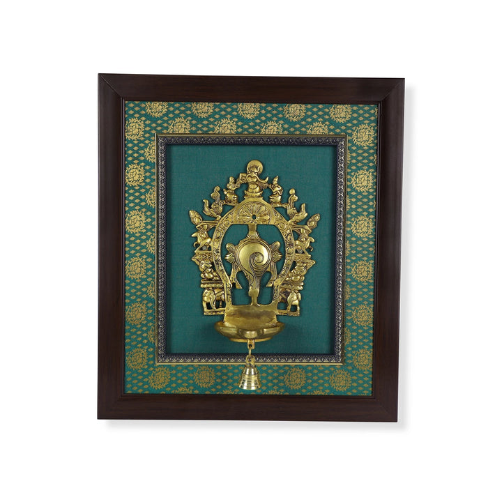 Brass Arch Shankh With Diya Framed On Raw Silk Photo Frame - 18 x 15.5 Inches | Thiruvachi &Bell Picture Frame - Hindu God Photos & Frames