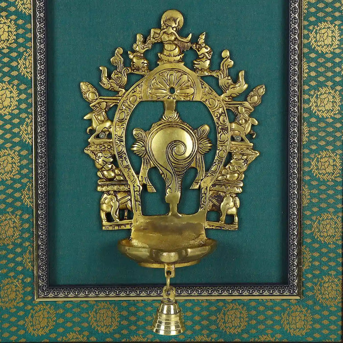 Brass Arch Shankh With Diya Framed On Raw Silk Photo Frame - 18 x 15.5 Inches | Thiruvachi &Bell Picture Frame - Hindu God Photos & Frames