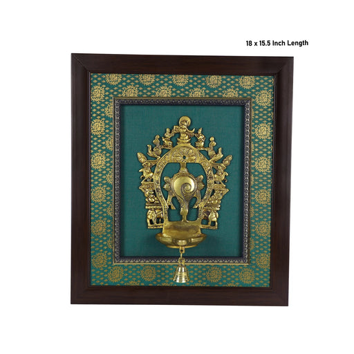 Brass Arch Shankh With Diya Framed On Raw Silk Photo Frame - 18 x 15.5 Inches | Thiruvachi &Bell Picture Frame - Hindu God Photos & Frames