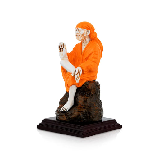 Saibaba Statue - 5 x 2.7 Inches | Saffron Finish Saibaba Idol / Saibaba Sitting Murti/ Shirdi Sai Baba Vigraham - Fibre Murties